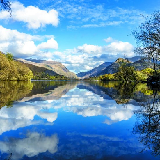 Reflections At Llyn Padarn With Dolbadarn Castle At Llanberis In